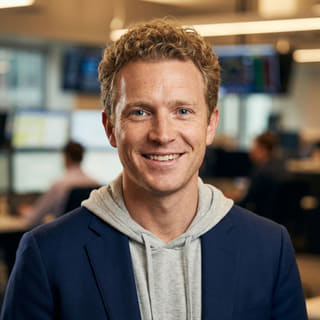Ryan Brooks, listed as Lead Trading Analyst at Coinium Ledgode, shown in a profile image